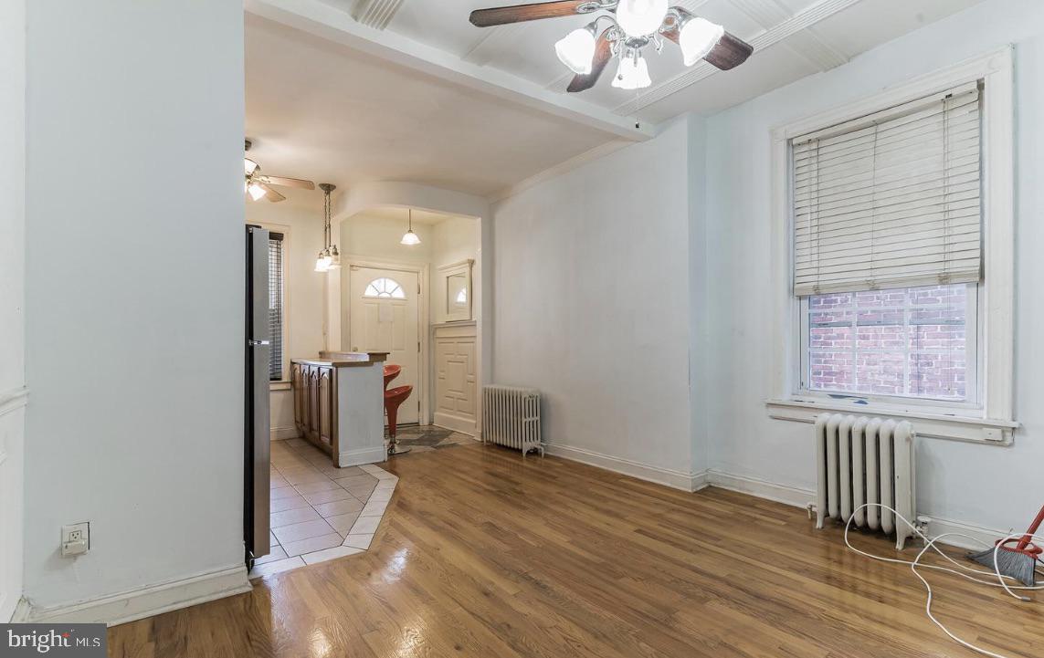 220 South 53rd Street Philadelphia, PA 19139 - Photo 6 of 15 wooden floor in an empty room with a window