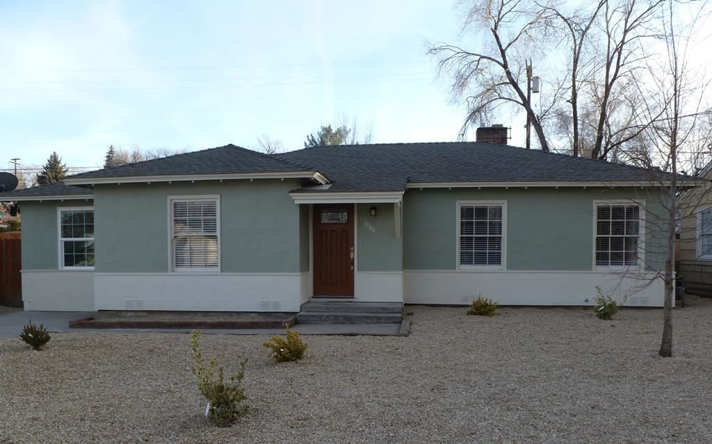 1980 Vale Street Reno, NV 89509 - Photo 1 of 1 a front view of a house with a yard