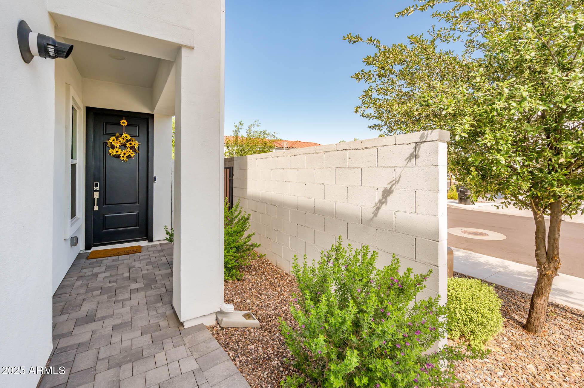 17146 North 50th Street Scottsdale, AZ 85254 - Photo 17 of 51 a front view of a house with a yard and an outdoor seating