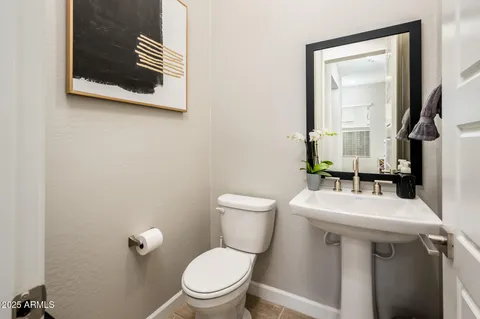 a view of a dining room with furniture and window