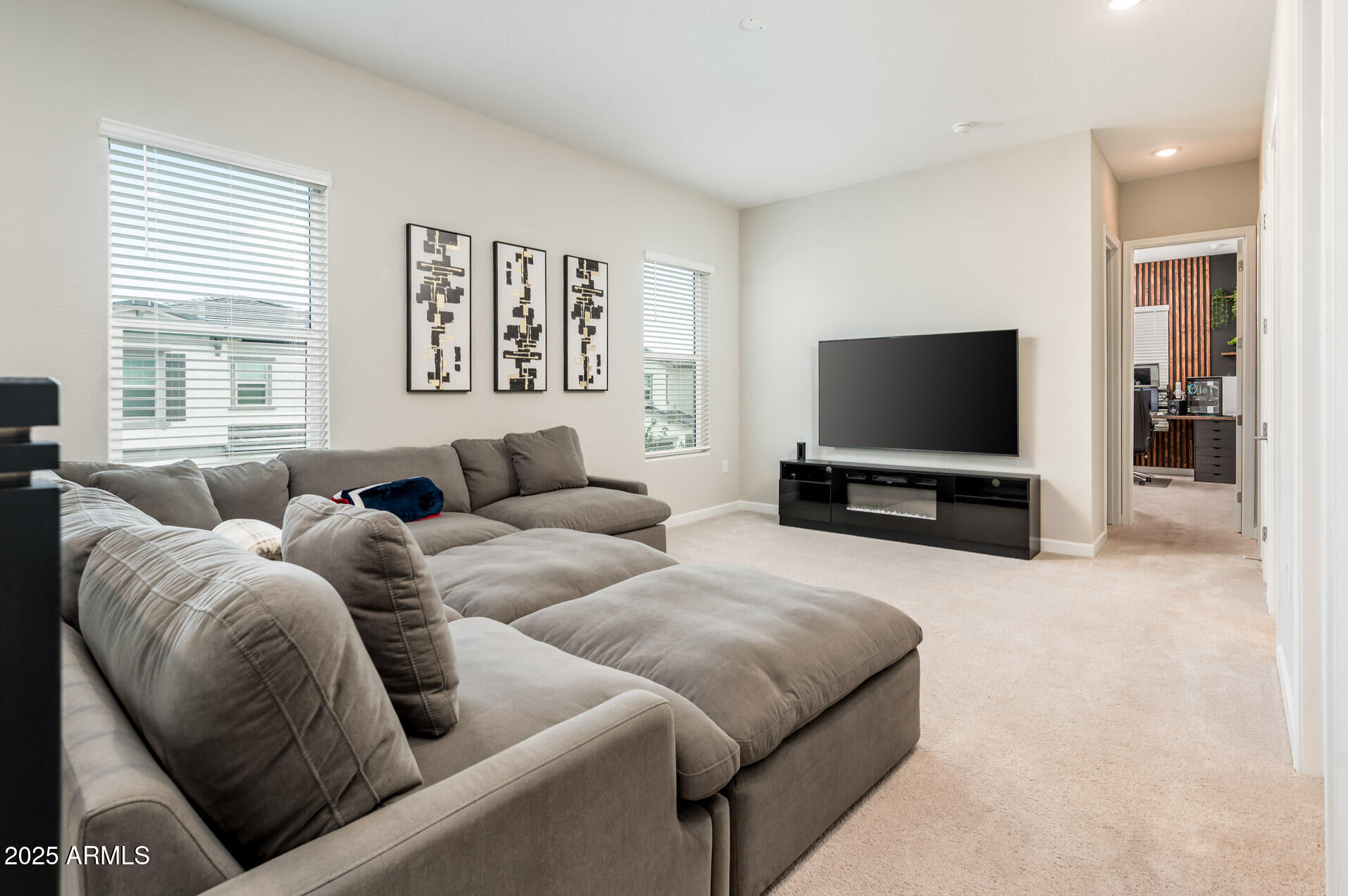 17146 North 50th Street Scottsdale, AZ 85254 - Photo 33 of 51 a living room with furniture and a flat screen tv