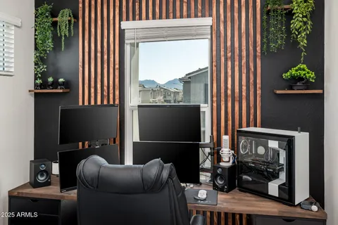 an outdoor view with a swimming pool and mountain view