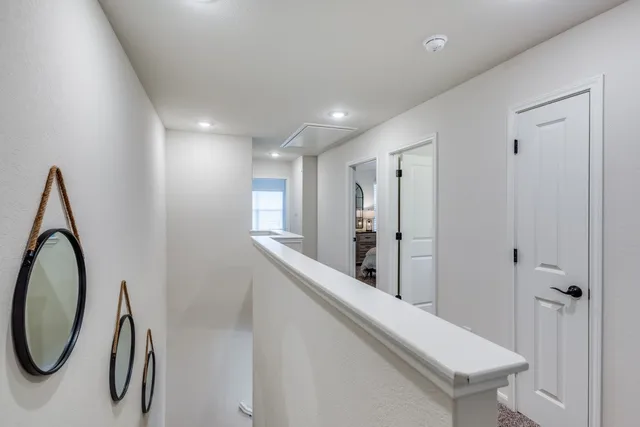 a view of a hallway with entryway