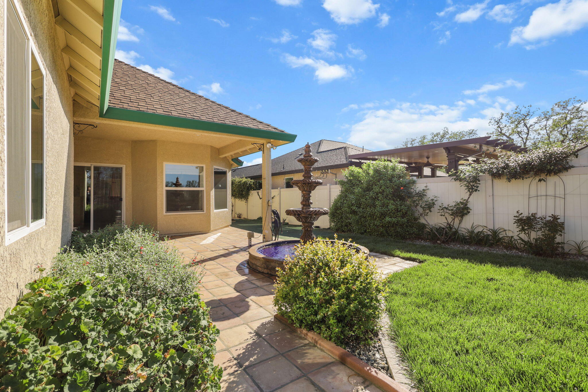 2110 Cadjew Street Redding, CA 96003 - Photo 53 of 62 a view of a house with backyard and sitting area