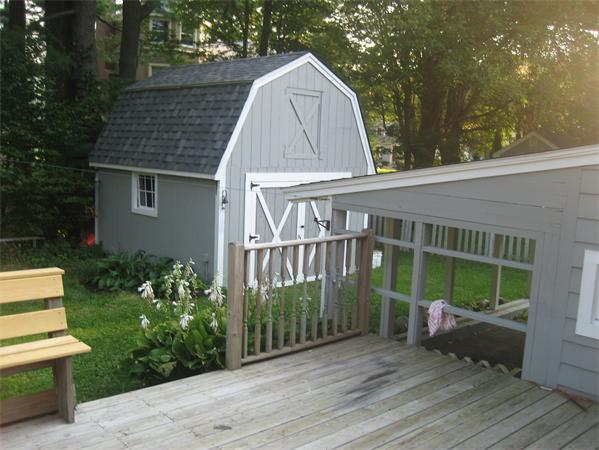 7 Hatfield Road Hamilton, MA 01982 - Photo 13 of 14 a view of a house with a yard and plants