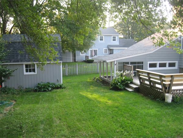 7 Hatfield Road Hamilton, MA 01982 - Photo 3 of 14 a front view of a house with a garden