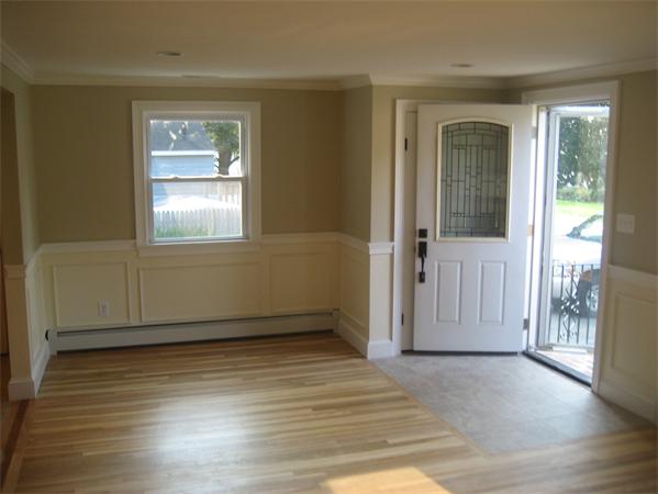 7 Hatfield Road Hamilton, MA 01982 - Photo 4 of 14 an empty room with wooden floor and windows