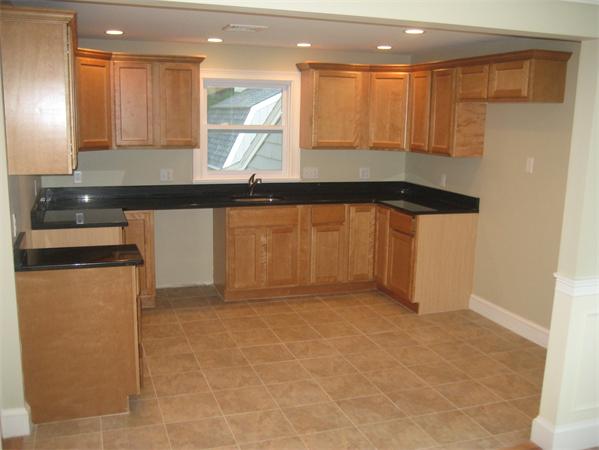 7 Hatfield Road Hamilton, MA 01982 - Photo 6 of 14 a kitchen with stainless steel appliances granite countertop a sink and a stove