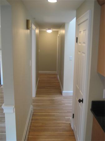 7 Hatfield Road Hamilton, MA 01982 - Photo 7 of 14 a view of a hallway with wooden floor