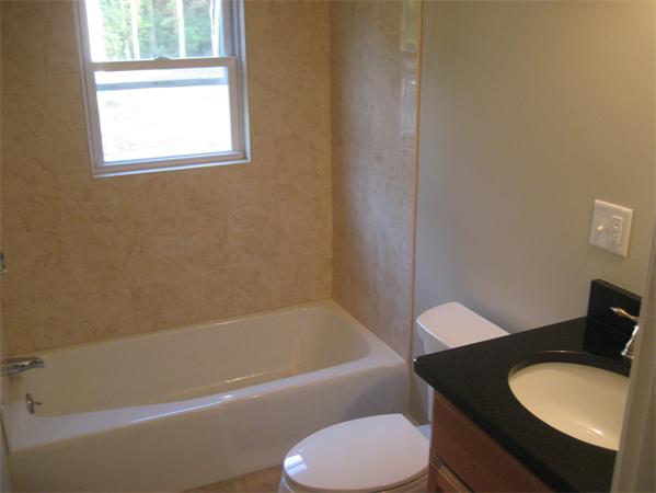 7 Hatfield Road Hamilton, MA 01982 - Photo 8 of 14 a bathroom with a granite countertop toilet sink and bathtub
