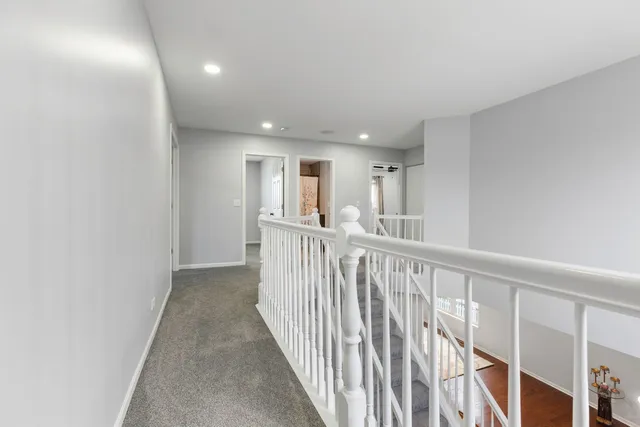 a view of a hallway with closet