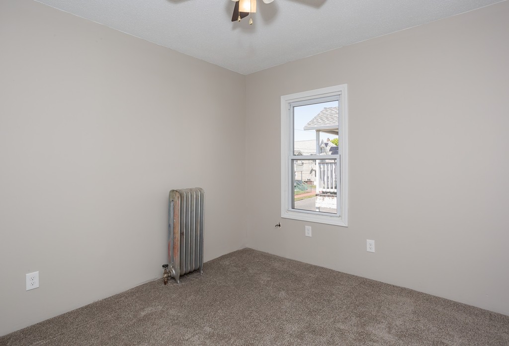 31-33 Grover Street Springfield, MA 01104 - Photo 24 of 25 an empty room with windows