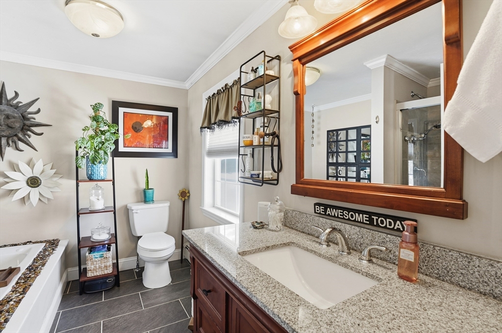 9 Kanehoe Court Townsend, MA 01474 - Photo 16 of 31 a bathroom with a granite countertop sink and a large mirror