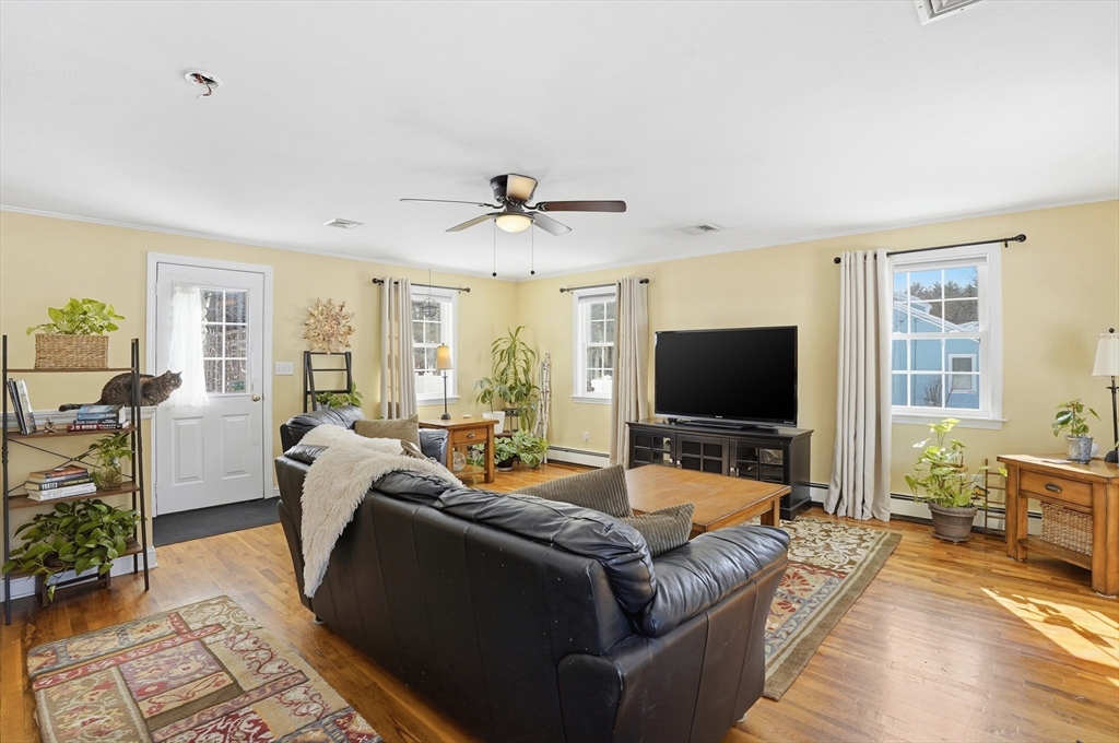 9 Kanehoe Court Townsend, MA 01474 - Photo 4 of 31 a living room with furniture and a flat screen tv