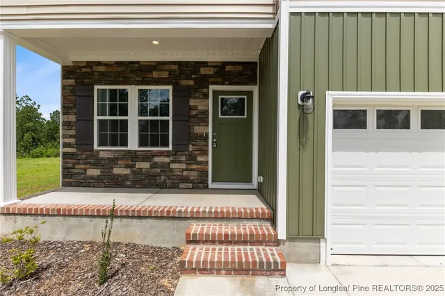 a view of hallway with windows