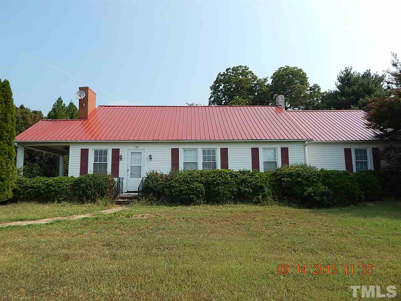 197 Thee Hester Road Roxboro, NC 27574 - Photo 1 of 16 a front view of a house with a yard