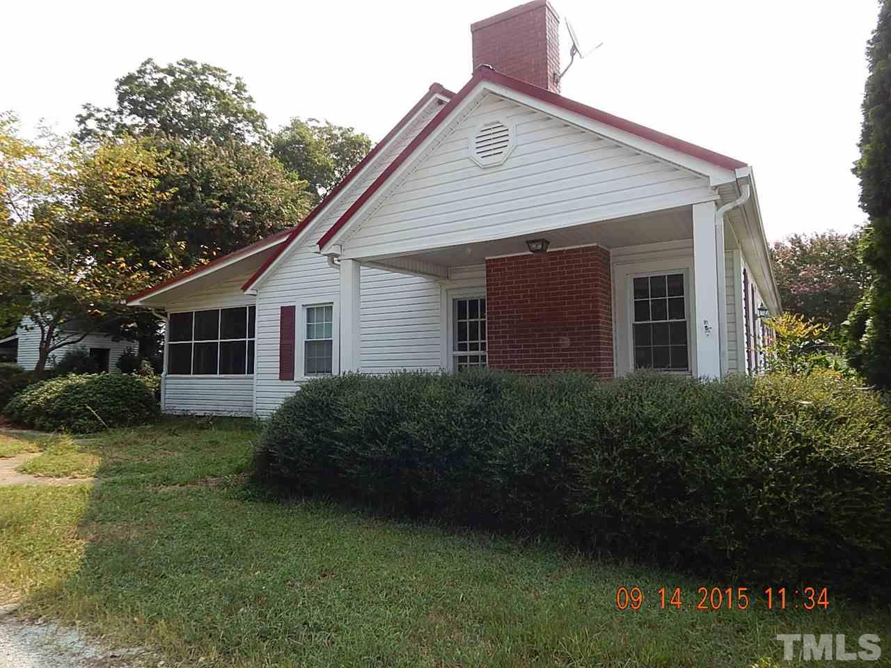 197 Thee Hester Road Roxboro, NC 27574 - Photo 2 of 16 a view of a house with a garden