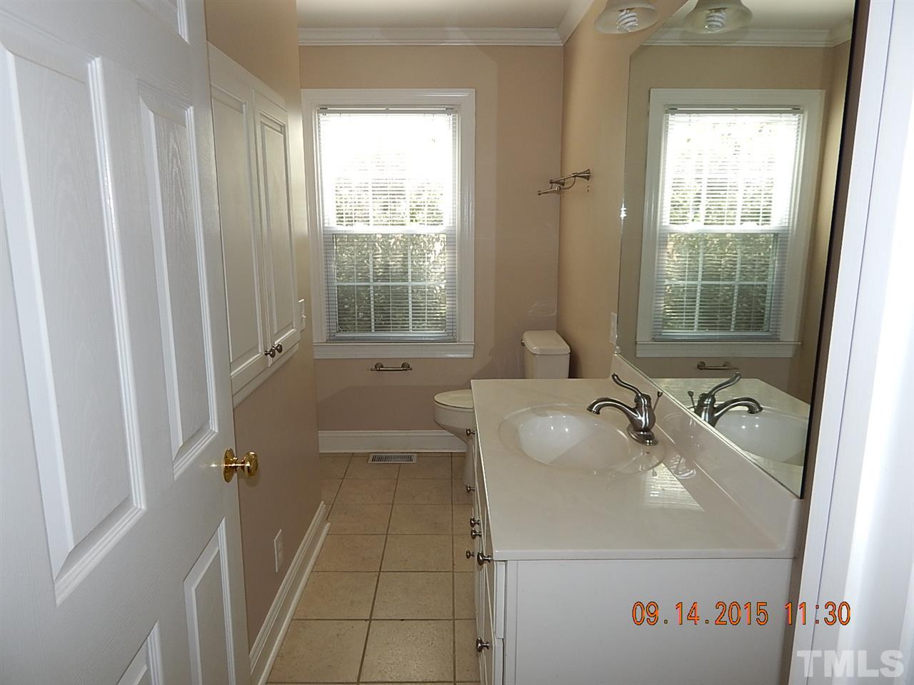197 Thee Hester Road Roxboro, NC 27574 - Photo 12 of 16 a bathroom with a sink and a tub