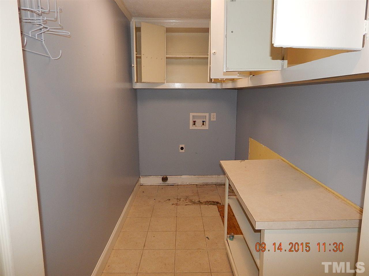 197 Thee Hester Road Roxboro, NC 27574 - Photo 14 of 16 a bathroom with a sink and a mirror
