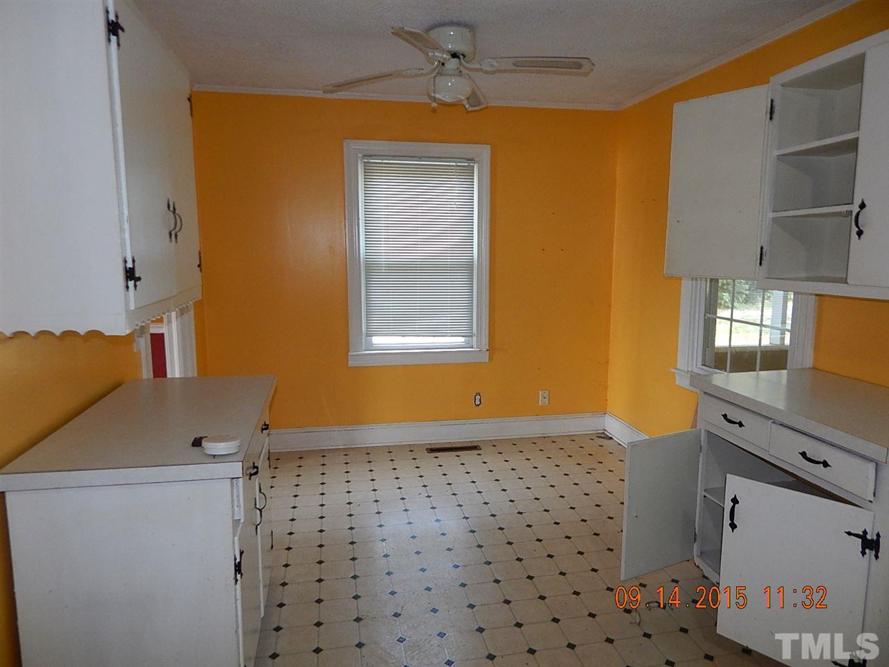 197 Thee Hester Road Roxboro, NC 27574 - Photo 6 of 16 a bathroom with a bathtub sink and mirror