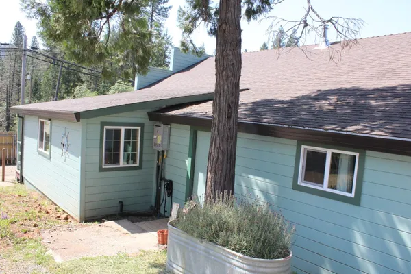 a view of a house with a patio