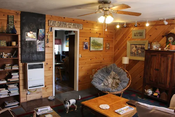 a bed room with furniture and a window