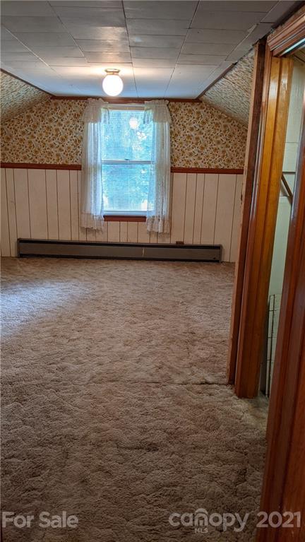 332 Jericho Road Harmony, NC 28634 - Photo 14 of 17 a view of a room with wooden floor and window