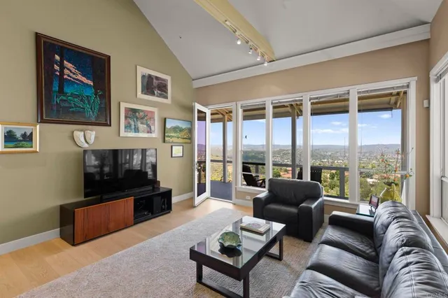 a view of a chair and table in the balcony