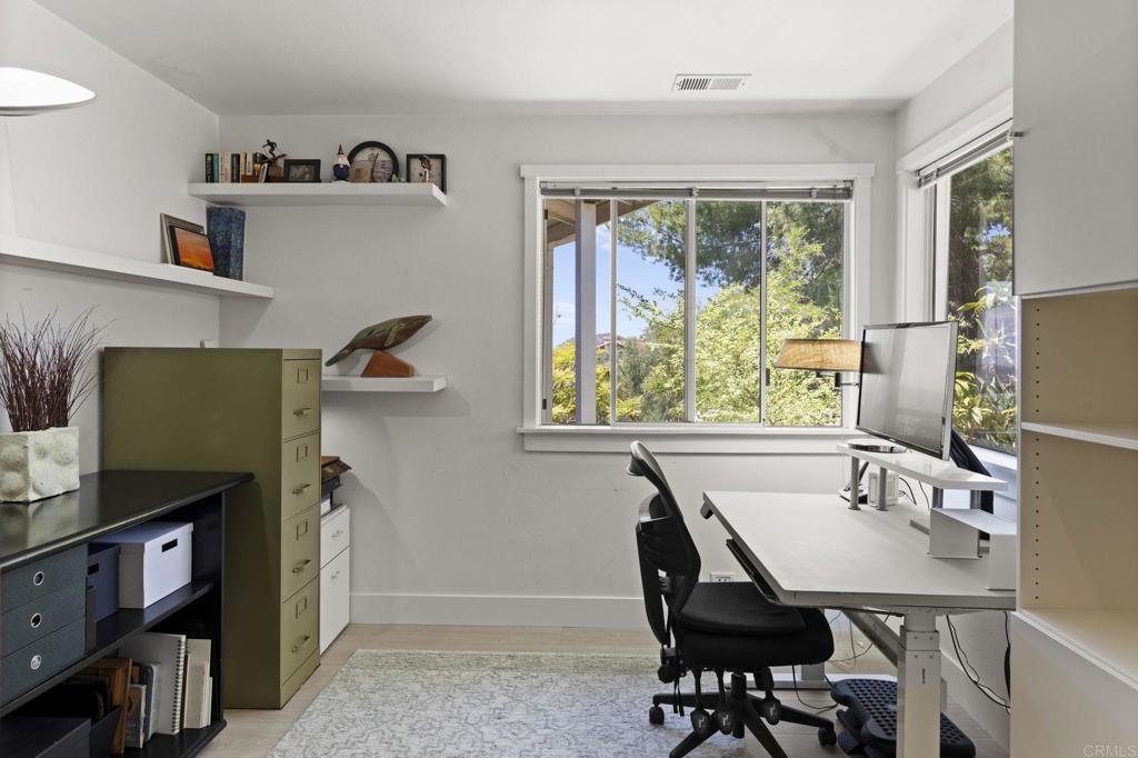 14645 High Valley Road Poway, CA 92064 - Photo 23 of 34 a view of a dining room with furniture and a window