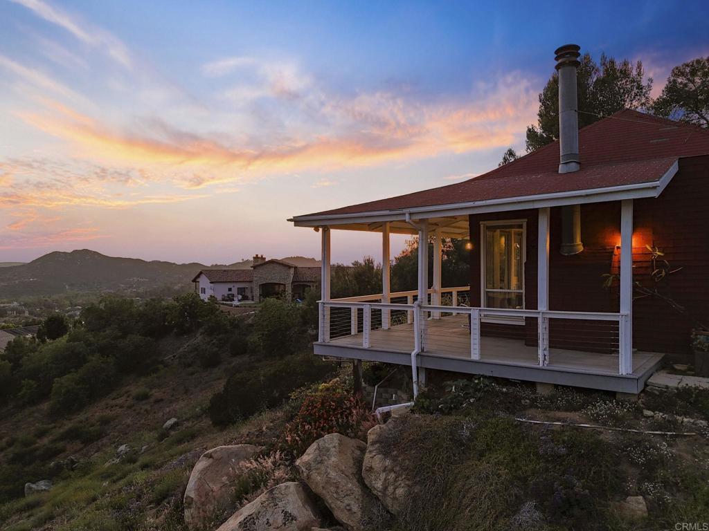 14645 High Valley Road Poway, CA 92064 - Photo 26 of 34 a view of a house with a yard balcony and outdoor seating
