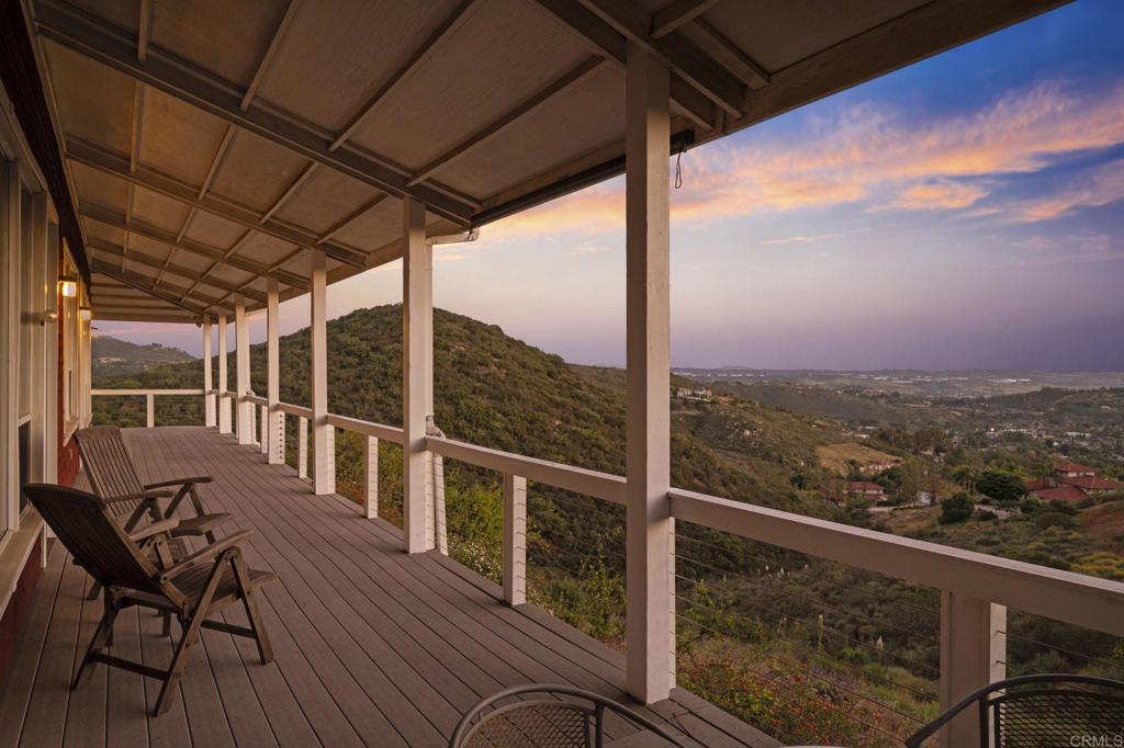 14645 High Valley Road Poway, CA 92064 - Photo 33 of 34 a view of a balcony with chair and wooden floor