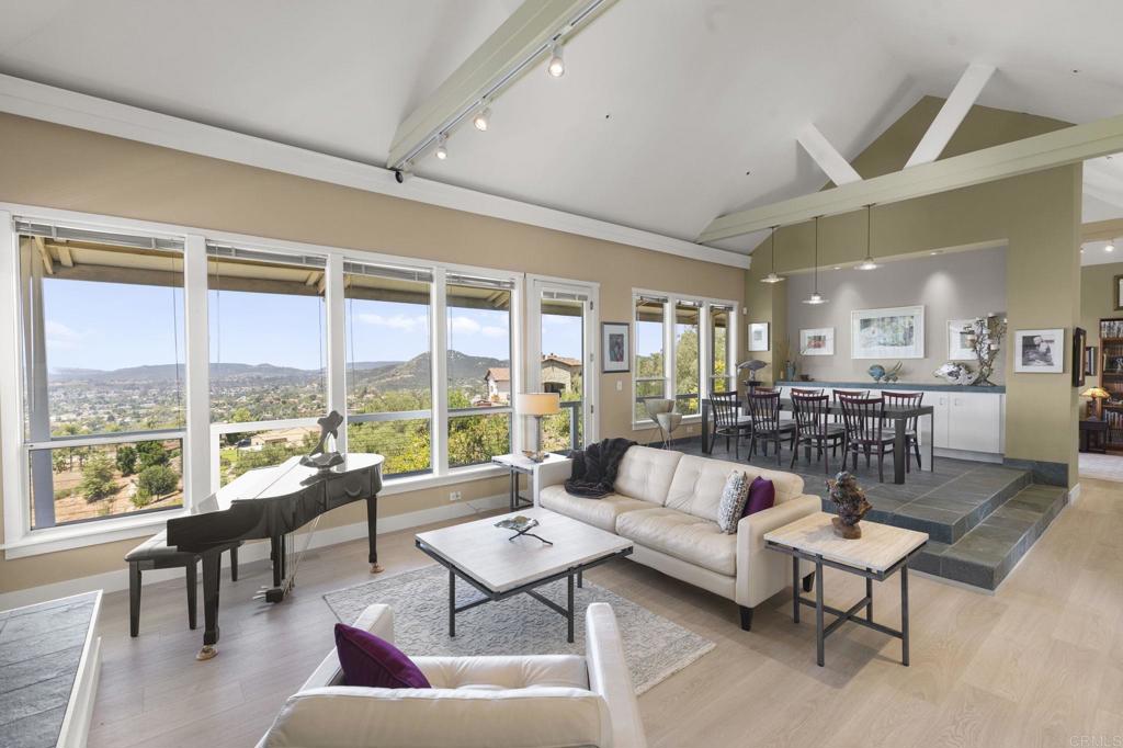 14645 High Valley Road Poway, CA 92064 - Photo 6 of 34 a living room with furniture and a large window