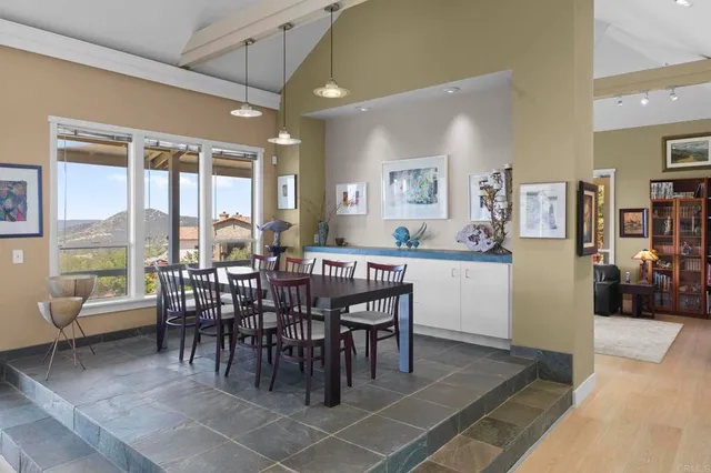 a large kitchen with stainless steel appliances lots of counter top space