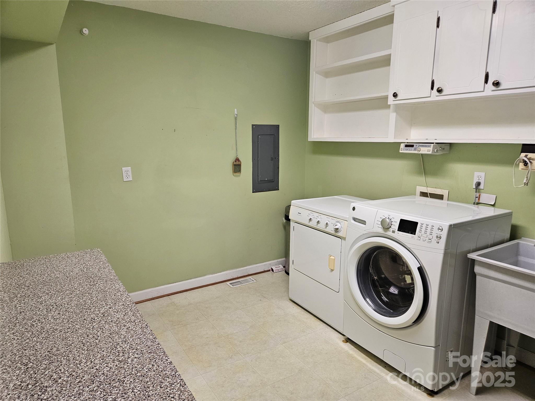 10670 Troutman Road Midland, NC 28107 - Photo 24 of 38 a utility room with dryer and washer