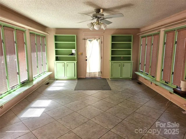 a view of entryway with a front door