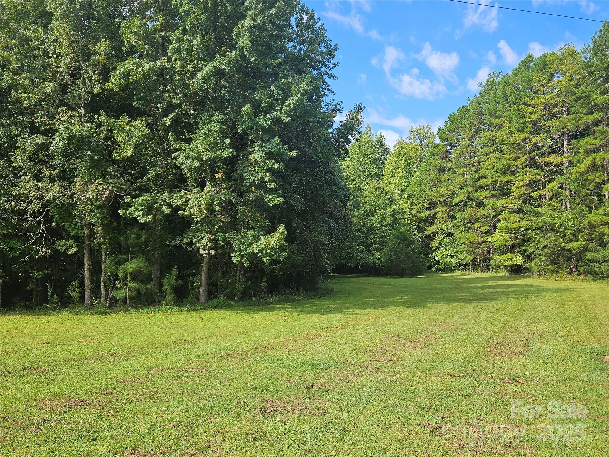 10670 Troutman Road Midland, NC 28107 - Photo 27 of 38 a view of outdoor space with deck and yard