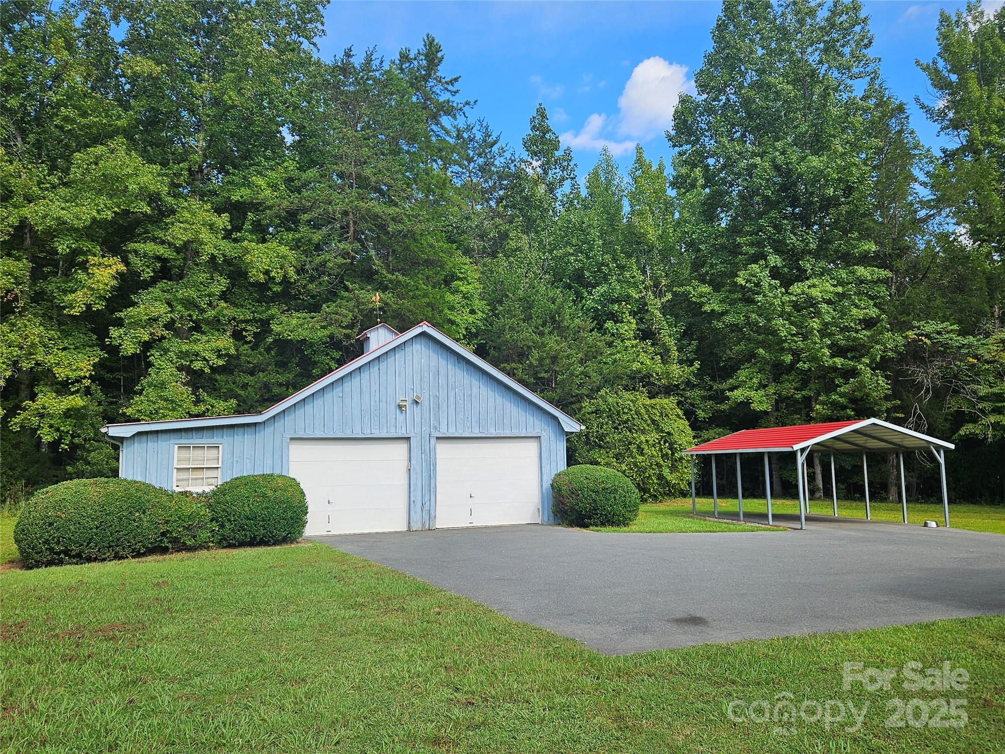 10670 Troutman Road Midland, NC 28107 - Photo 29 of 38 a front view of house with yard and green space