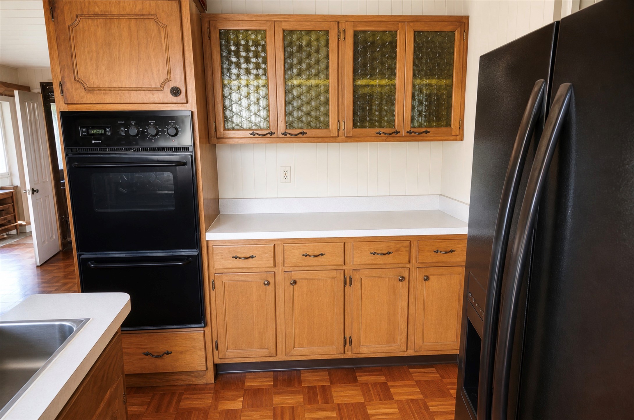 419 Fifth Street McLean, TX 79057 - Photo 17 of 34 a kitchen with granite countertop white cabinets and refrigerator