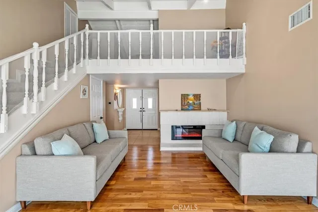 a living room with furniture and a couch