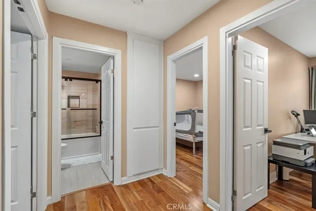 a view of a bathroom from the hallway