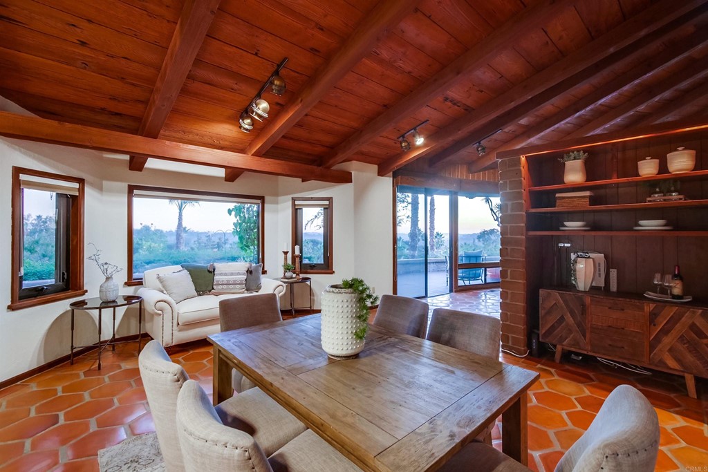 1256 Rancho Encinitas Drive Encinitas, CA 92024 - Photo 9 of 28 a view of a dining room with furniture window and outside view