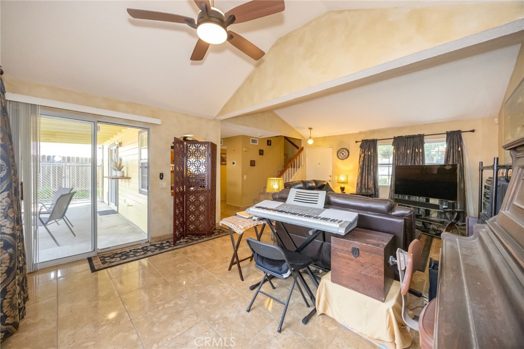 1907 Pepper Tree Lane East Colton, CA 92324 - Photo 25 of 33 a view of a workspace with furniture and a window