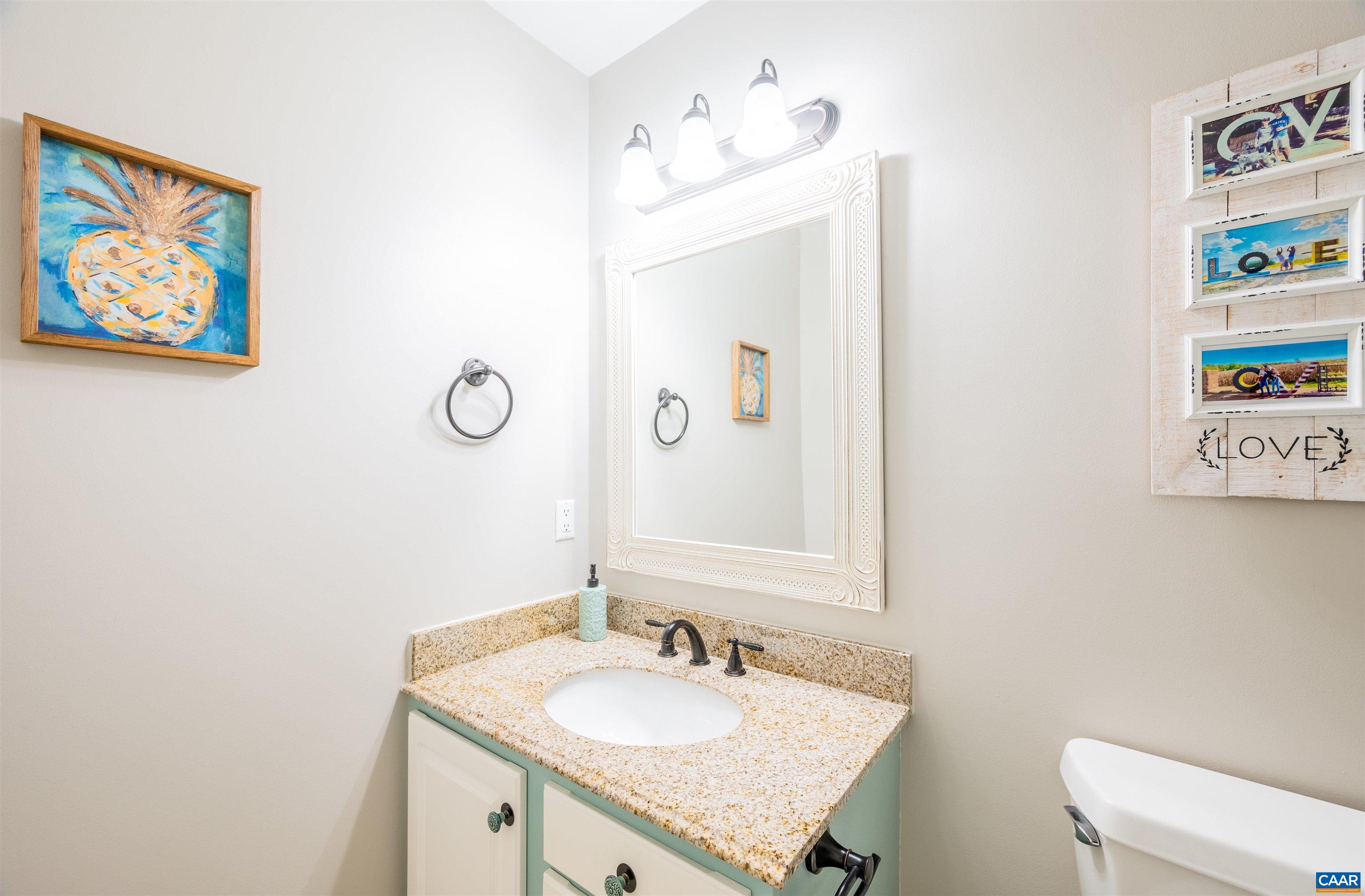 308 Starcrest Road Charlottesville, VA 22902 - Photo 21 of 35 a bathroom with a granite countertop sink mirror and toilet
