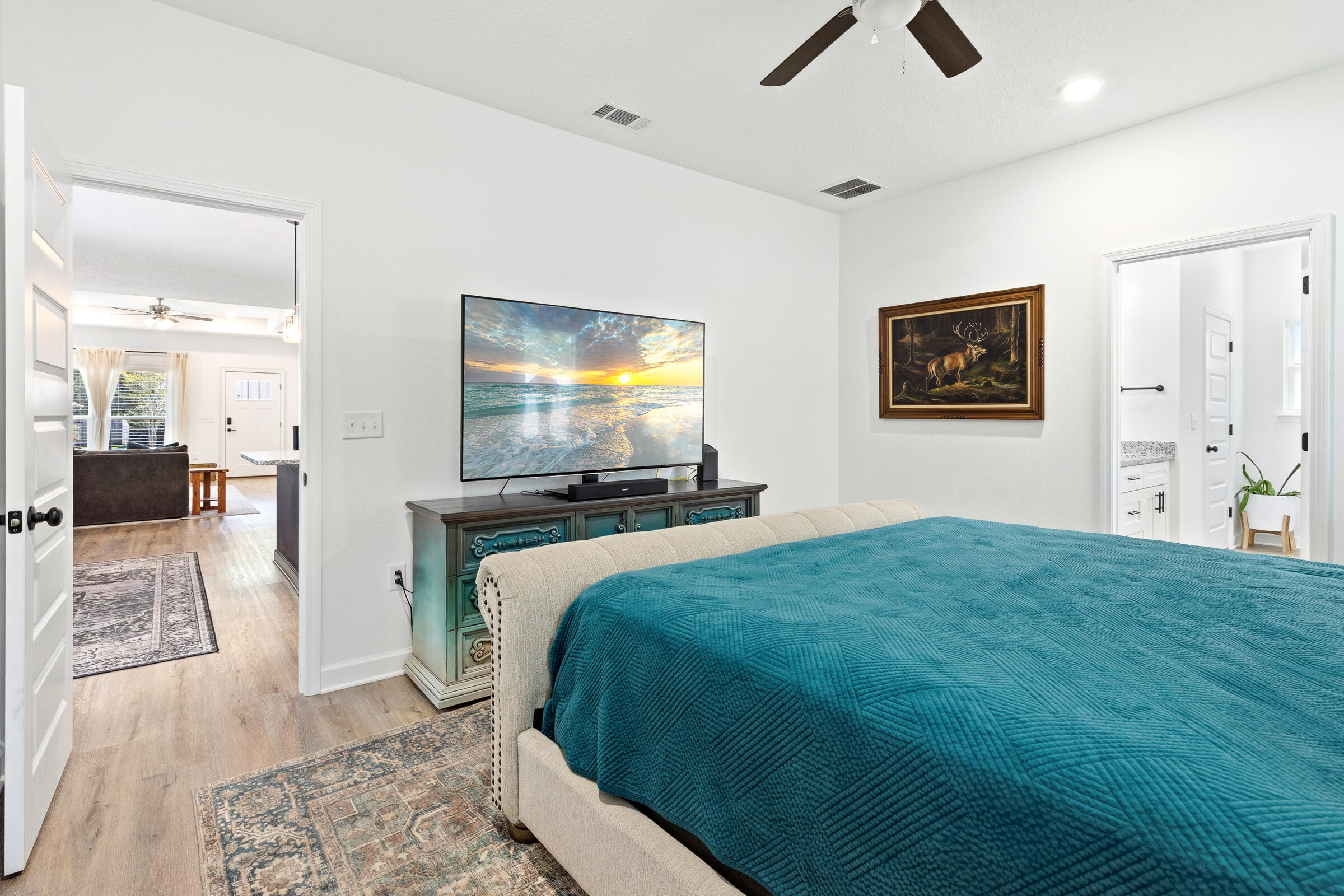 65 Marsh Landing North Freeport, FL 32439 - Photo 14 of 35 a bedroom with a bed and a flat screen tv