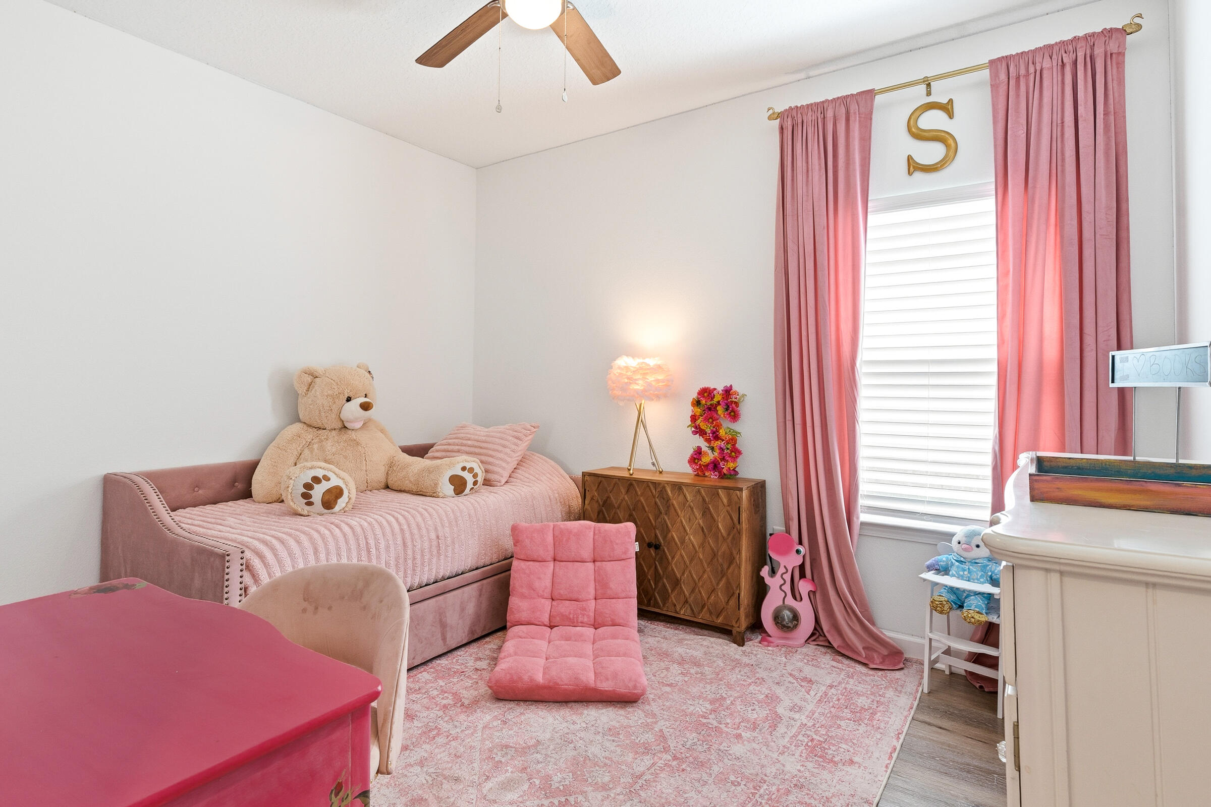 65 Marsh Landing North Freeport, FL 32439 - Photo 17 of 35 a bedroom with furniture and a window