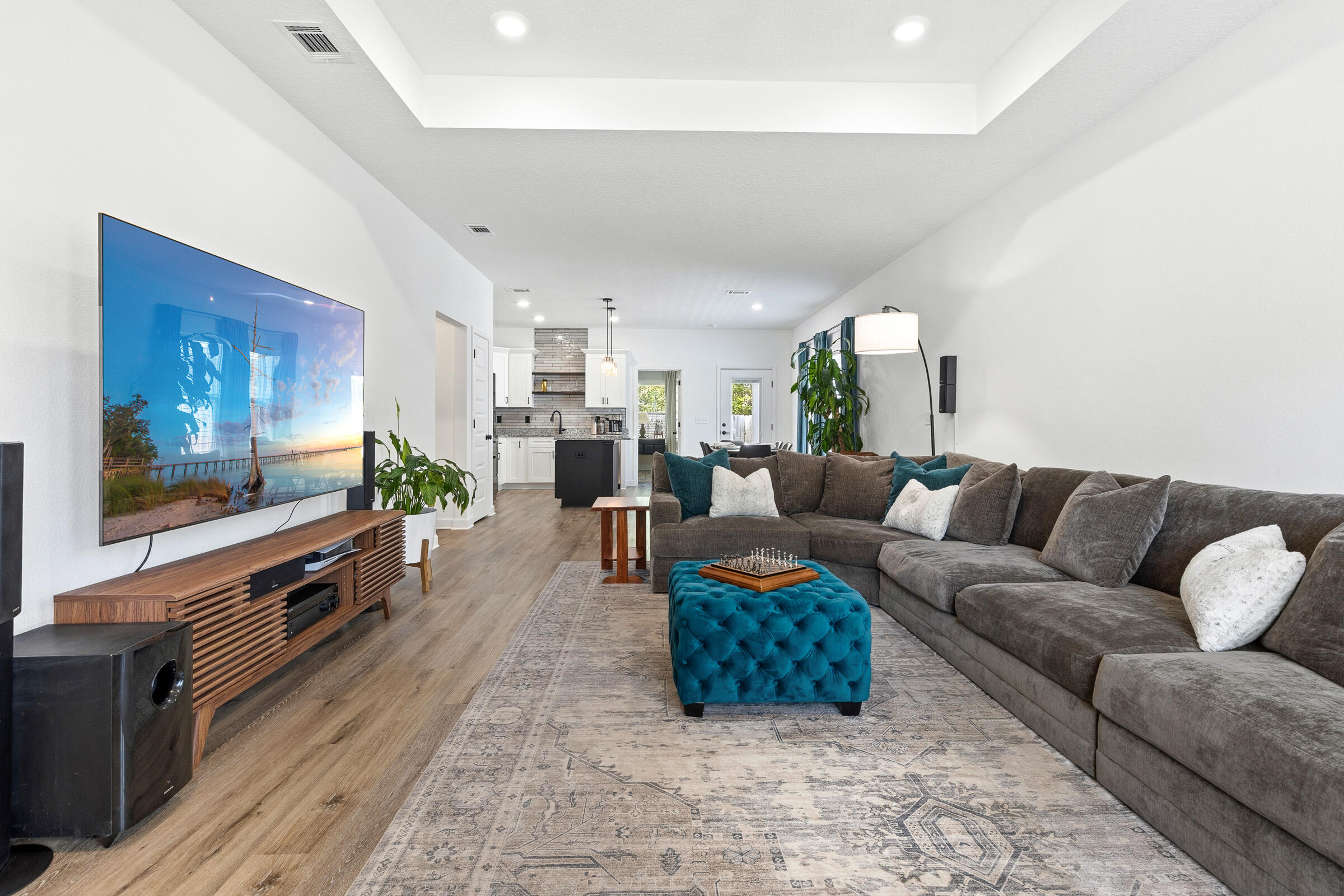 65 Marsh Landing North Freeport, FL 32439 - Photo 2 of 35 a living room with furniture and a flat screen tv