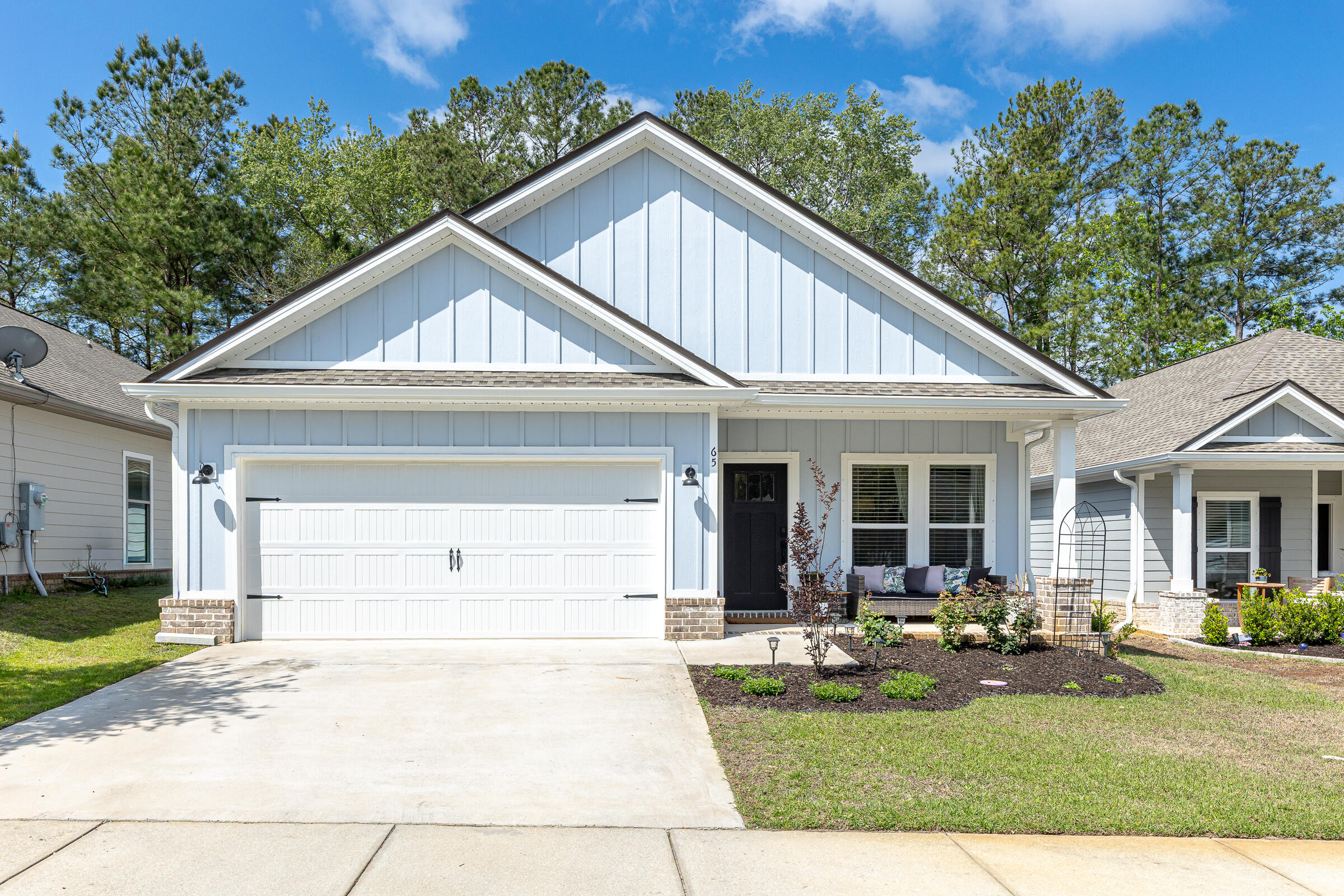 65 Marsh Landing North Freeport, FL 32439 - Photo 21 of 35 a view of house and yard with green space