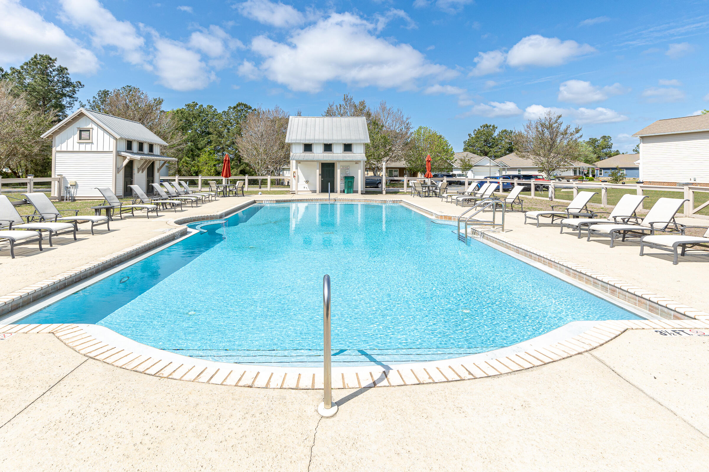 65 Marsh Landing North Freeport, FL 32439 - Photo 33 of 35 a view of a swimming pool with outdoor seating