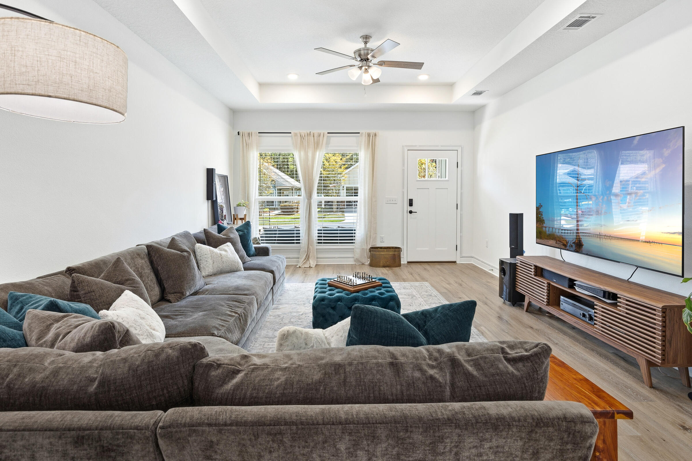 65 Marsh Landing North Freeport, FL 32439 - Photo 5 of 35 a living room with furniture and a flat screen tv