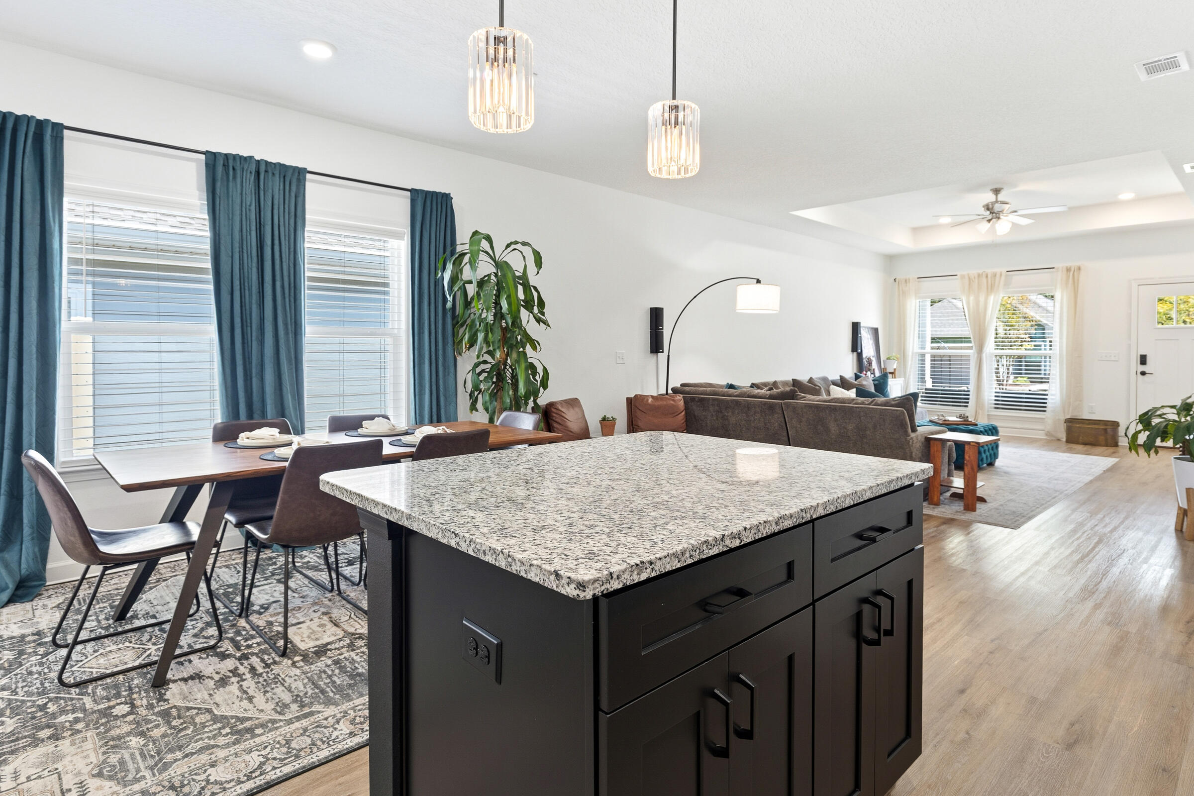 65 Marsh Landing North Freeport, FL 32439 - Photo 10 of 35 a kitchen with a counter space windows and wooden floor